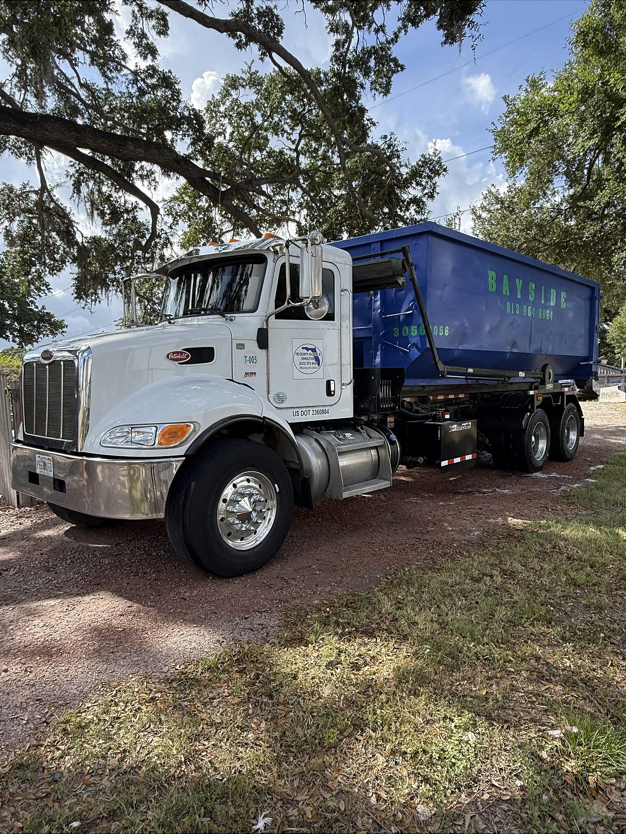 Global Recycling roll-off truck up close