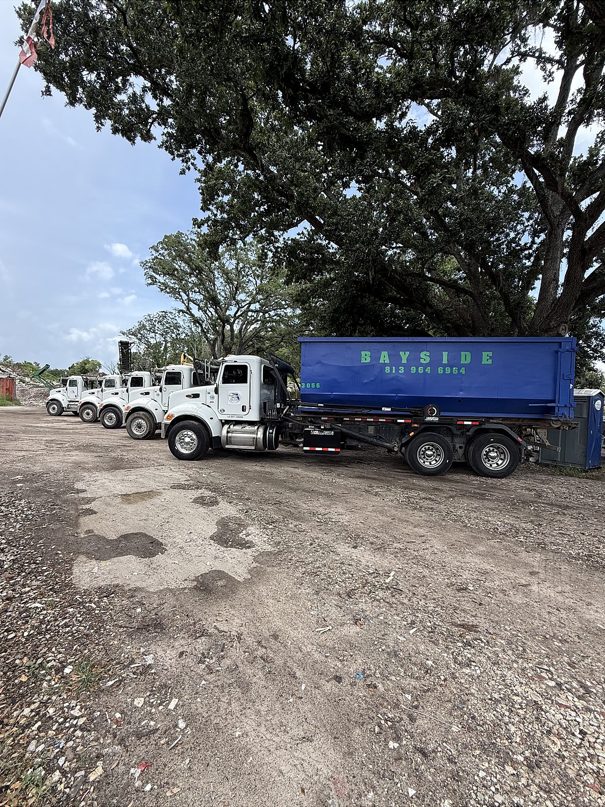Global Recycling roll-off truck and dumpster
